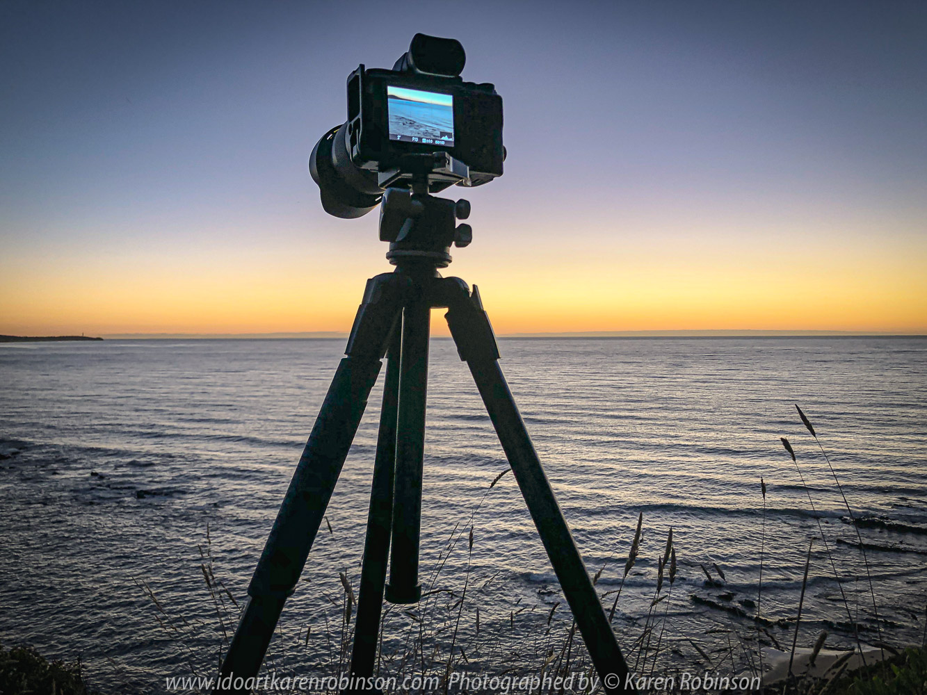 Eastern View, Victoria - Australia 'Devil's Elbow at Sunrise' Photographed by Karen Robinson February 2021 Comments: Beautiful mild summer morning overlooking the ocean along Lorne-Queenscliff Coastal Reserve, just off the Great Ocean Road. Photograph featuring Camera setup on Tripod ready for taking photographs of the sunrise.
