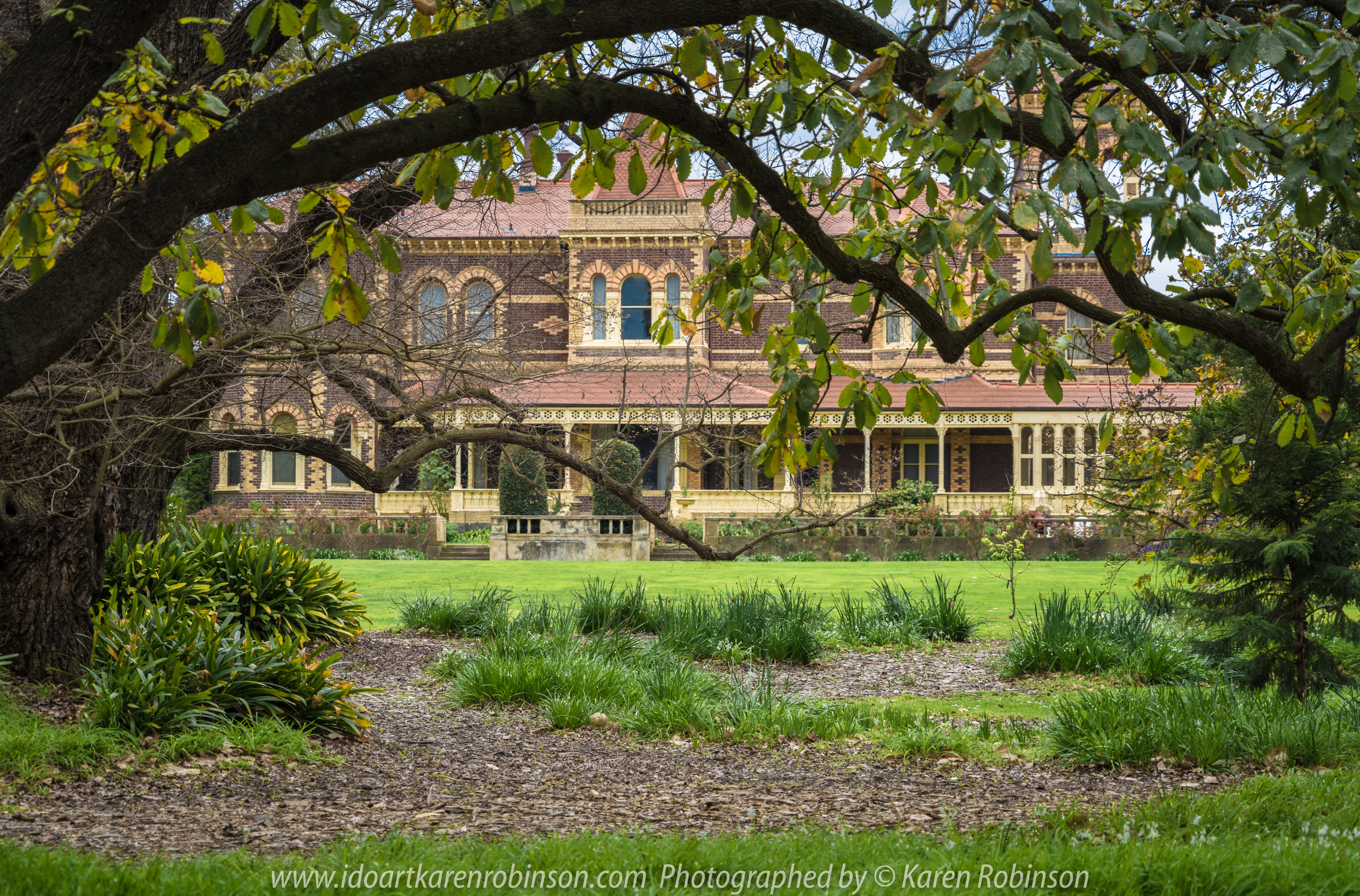 Elsternwick, Victoria - Australia_Photographed by ©Karen Robinson_ www.idoartkarenrobinson.com September 10, 2017 Comments: My hubby and I with the Craigieburn Camera Club at Rippon Lea House and Gardens. "It is one of Australia's finest grand suburban estates and the first to achieve National Heritage Listing, recognising its unique significance. The historic mansion is located within a vast pleasure garden of sweeping lawns that cover more than 14 acres and features a windmill, lookout tower, heritage orchard, lake, waterfall, fernery and more!" Photograph featuring front view of Mansion.