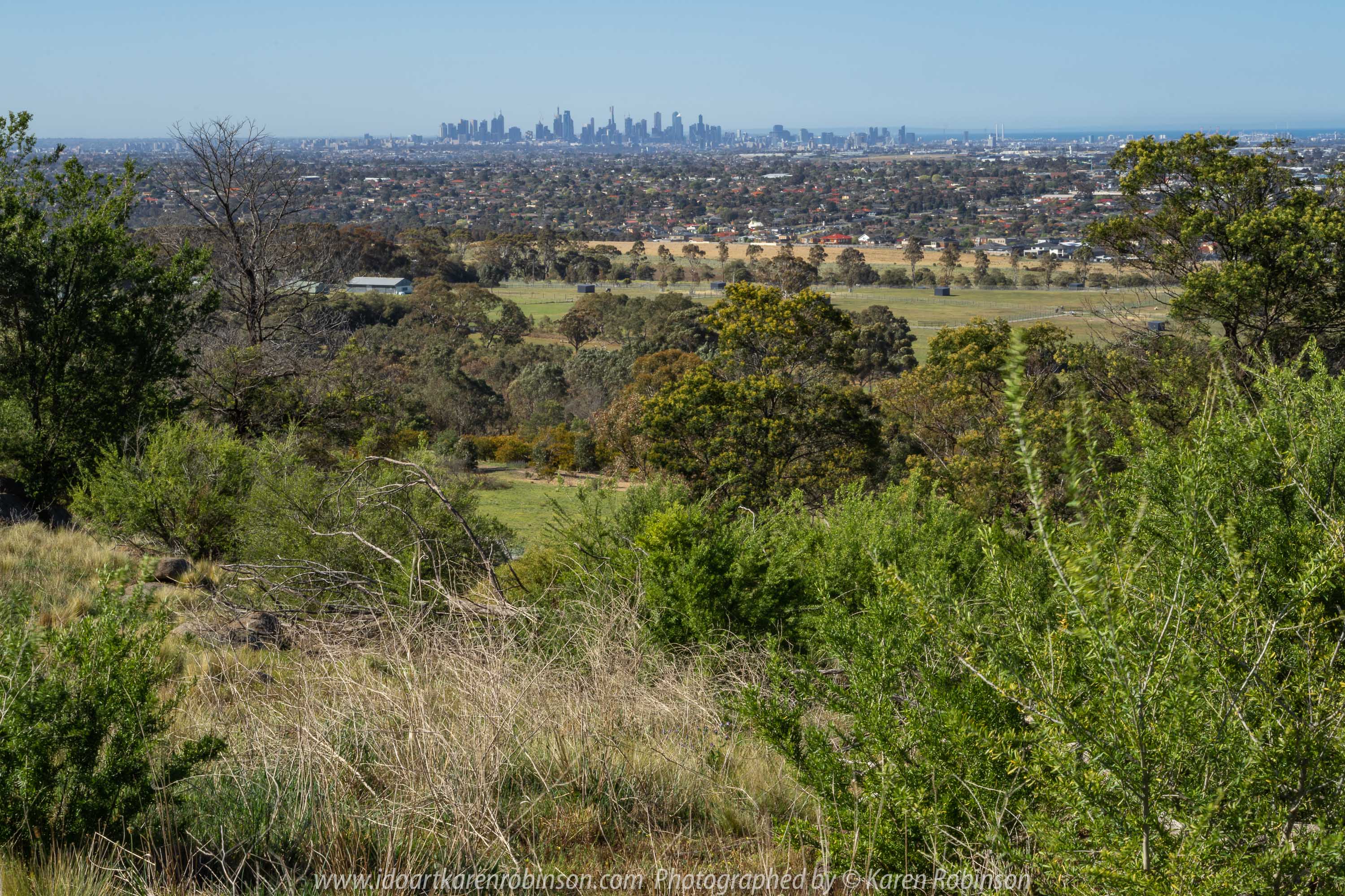 Greenvale, Victoria - Australia 'Gellibrand Hill Lookout' Photographed by Karen Robinson October 2018 Comments: Beautiful morning stroll spending a short time enjoying the panoramic views including Melbourne City Skyline, Melbourne Tullamarine Airport and the Great Dividing Range! Photograph featuring views towards Melbourne City Skyline.