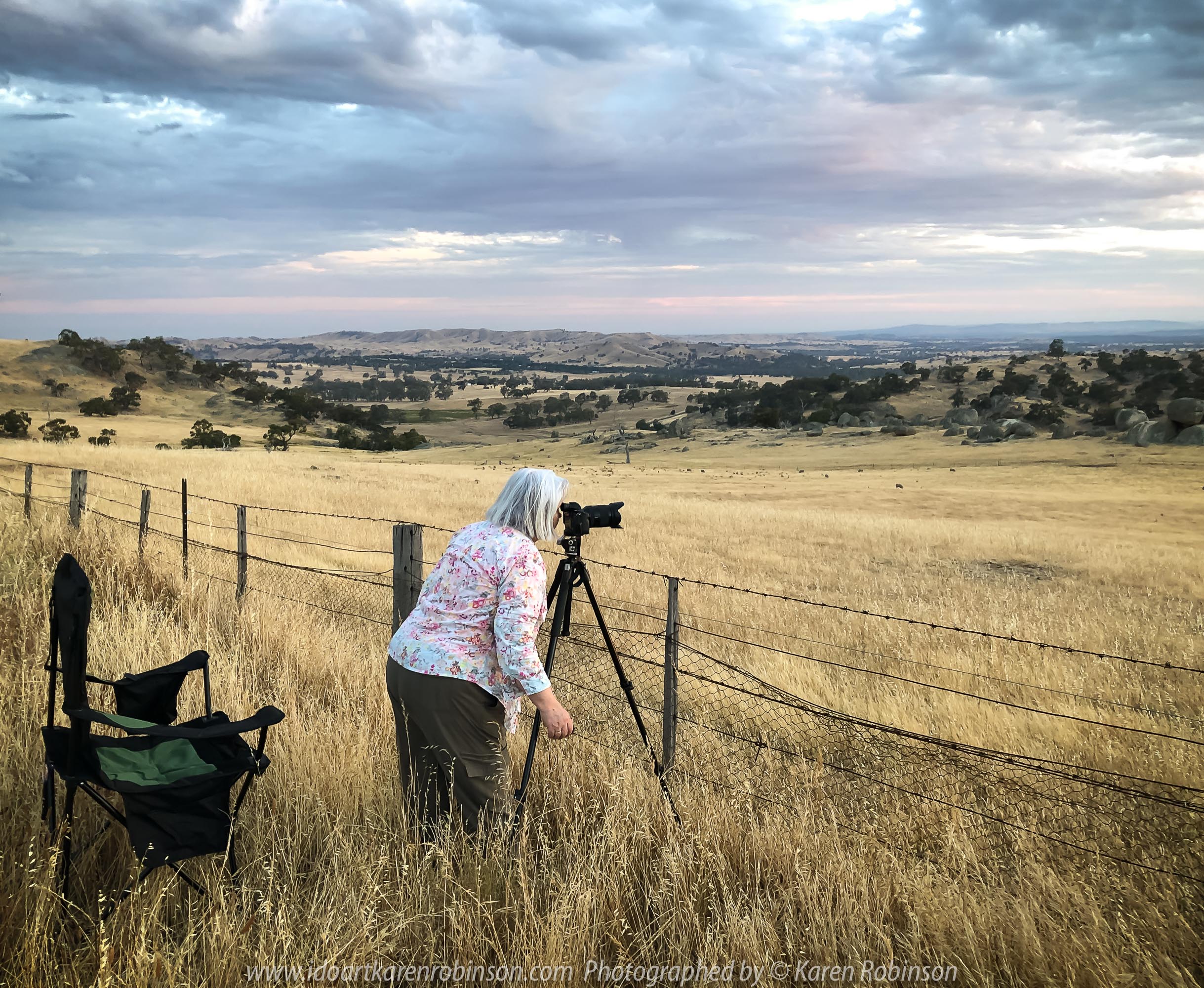 High Camp, Victoria - Australia 'Granite Boulder Region' Photographed by Karen Robinson December 2019 Comments: Beautiful early morning around sunrise in an area that features many giant granite boulders. Photographer Karen Robinson setting up shot of sunrise across the landscape.