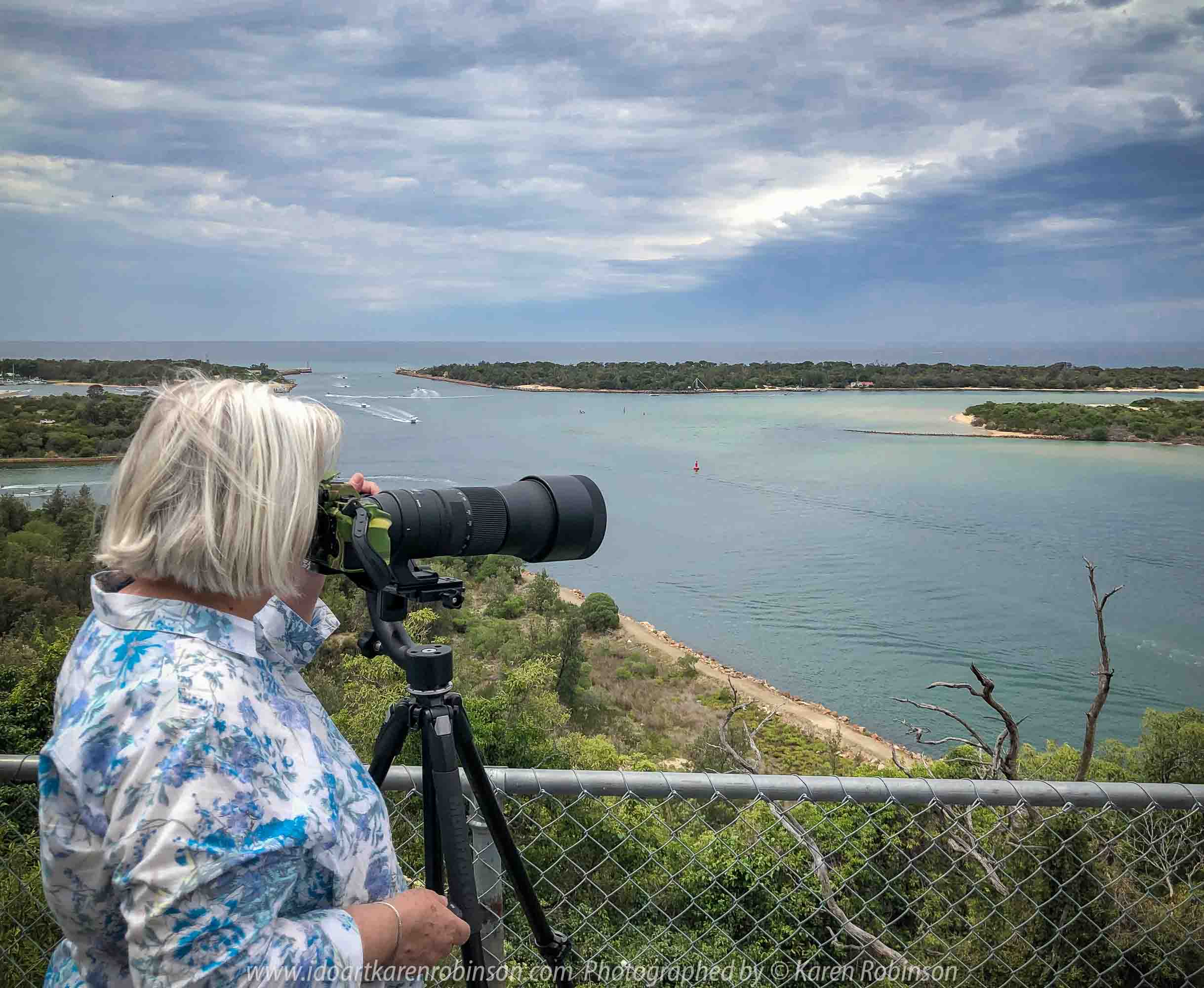 Lakes Entrance, Victoria - Australia 'Shoreline and Harbour Views' Photographed by Karen Robinson January 2019 Comments - On our way to see hubby's brother, we made a slight detour to visit this area. The weather was overcast but still pleasant. It was difficult to photography scenes I wanted and I realised that aerial shots would be best, so we went to a couple of lookouts to help capture some overview shots of Lakes Entrance. Photography featuring Karen Robinson taking photographs.