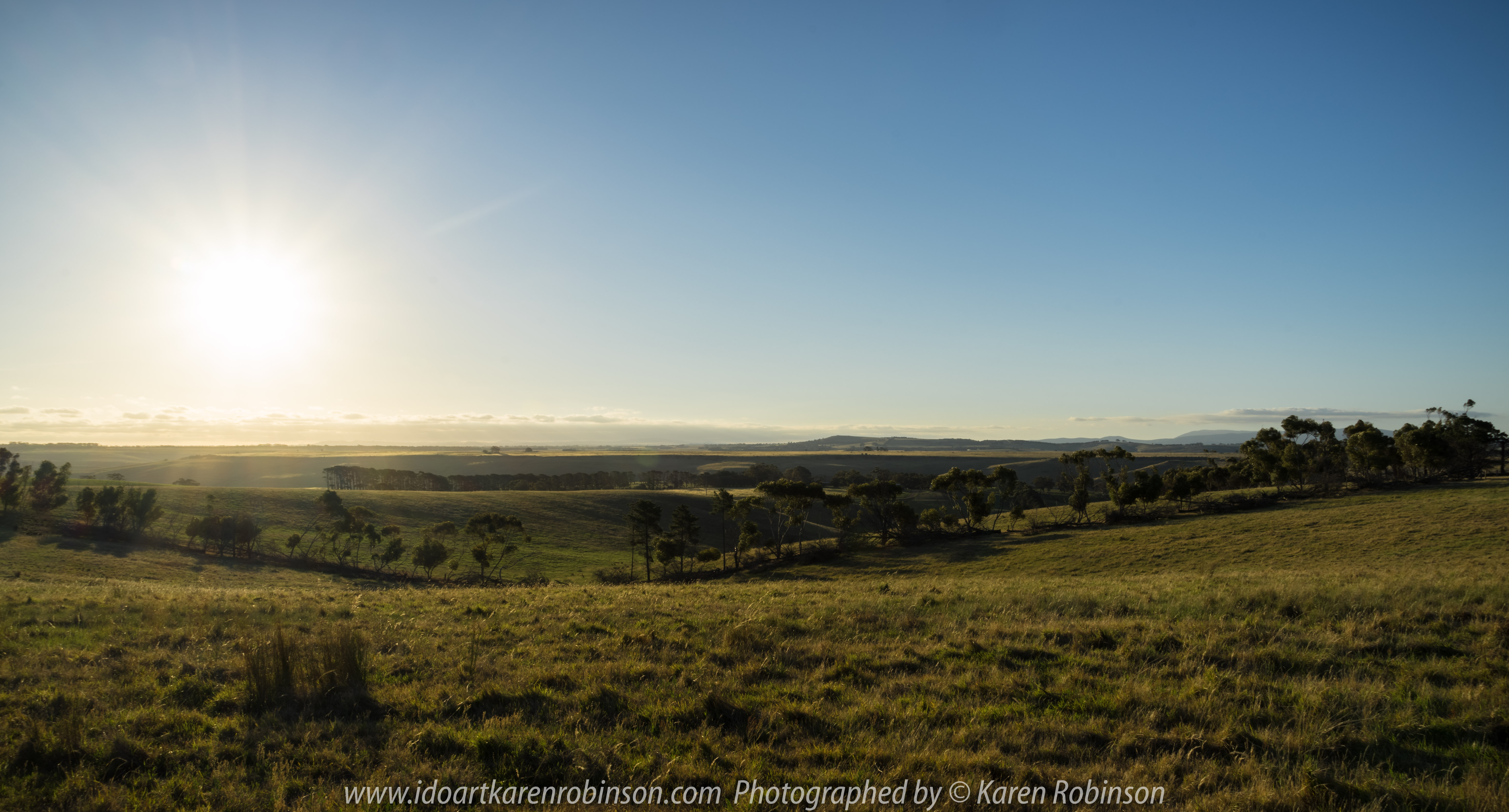 Mickleham, Victoria - Australia 'Sunset over Farmland' Photographed by Karen Robinson NB All images are protected by copyright laws_ www.idoartkarenrobinson.com December 11, 2017 Comments: Beautiful summer evening photographing the sunset during the 'golden hour'. It was quiet and the air fresh; I found myself completely immersed in my creativity.