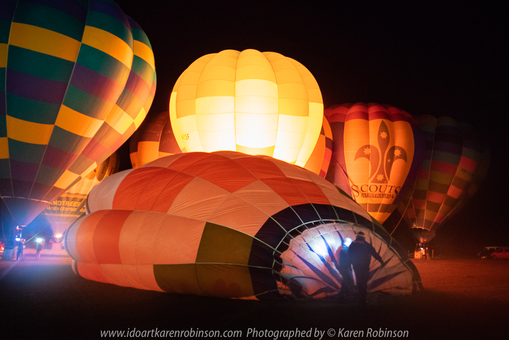 Milawa, Victoria - Australia 'King Valley Balloon Festival Night Glow Event' Photographed by Karen Robinson June 2018 NB: All images are protected by copyright laws. Comments - Part of the Balloon Festival involved an amazing visual sensation which featured 'Night Glow Light Show' at 7pm, located at the Brown Brothers Airfield, where hot-air balloons put on a colourfully light show that was backed dropped against a starry night sky. This spectacular event was witnessed by some 3,000 people!