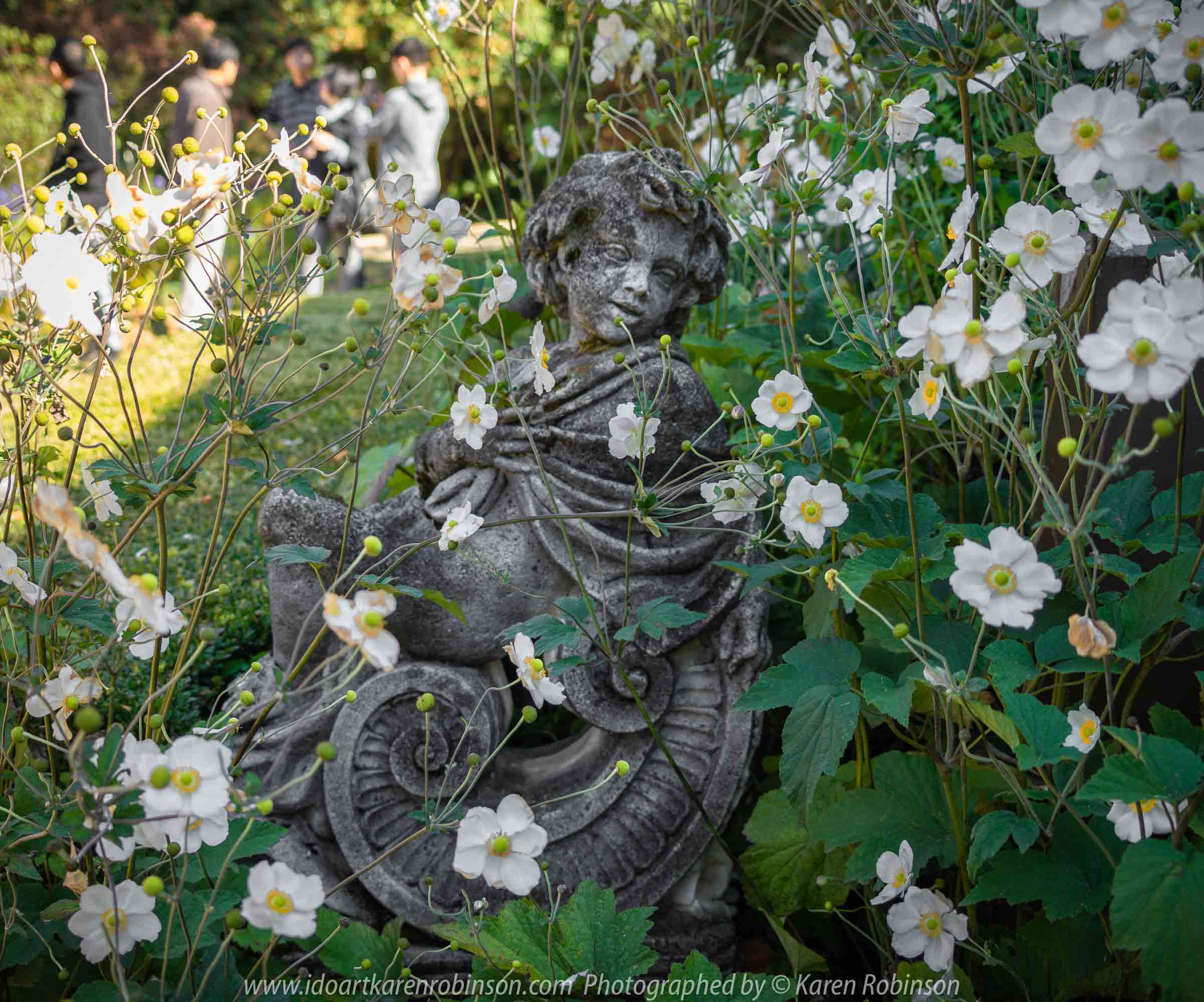 Mount Macedon, Victoria - Australia 'Duneira Heritage Garden' Photographed by Karen Robinson April 2019 Comments - A beautiful Autumn day with hubby at these magnificent gardens where tall trees are the dominating feature. Photograph featuring statue beside Main House stairway.