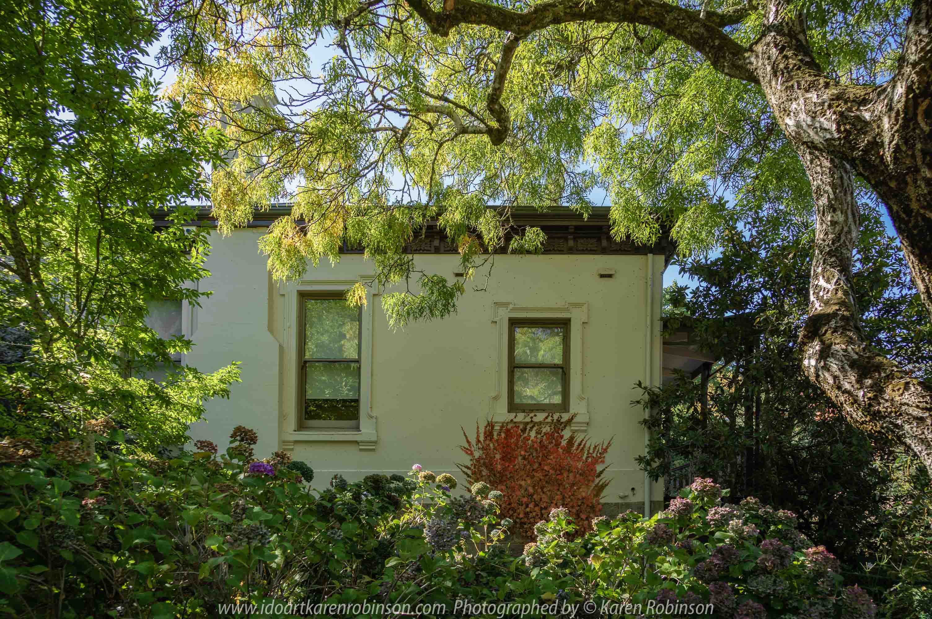 Mount Macedon, Victoria - Australia 'Duneira Heritage Garden' Photographed by Karen Robinson April 2019 Comments - A beautiful Autumn day with hubby at these magnificent gardens where tall trees are the dominating feature. Photograph featuring side of Main House and garden.