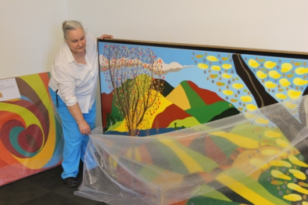 No. 16 - 'When words are hard to find' Solo Exhibition of Karen Robinson 6.5.15 Karen Robinson unwrapping bubble wrap at Gee Lee-Wik Doleen Gallery for Exhibition.JPG