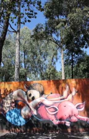 Photo No. 5 of 21 'KAFF-EINE' Street Artist Work - Melbourne Street Art Fitzroy at Smith Reserve on Alexander Parade - Just one of the amazing wondrous creatures along the walls. I can image children being in awe of these images as they walk along the path leading into the play ground. There is a lovely connection being the human like creature and the animal which I like - Photographed by Karen Robinson.JPG