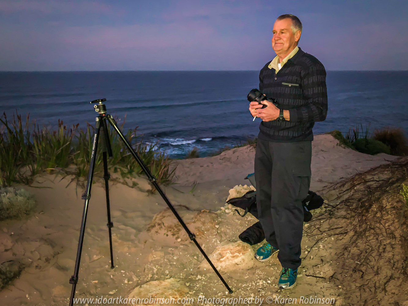 Sorrento, Victoria - Australia 'Jubilee Point' at Sunrise Photographed by ©Karen Robinson March 2021 Comments: Mild summer morning experiencing a glorious sunrise at Jubilee Point which looks out over Bass Strait, open ocean and towards the Bay of Islands. Photograph featuring hubby helping me set up the tripod and camera equipment in readiness for taking a sunrise shot.